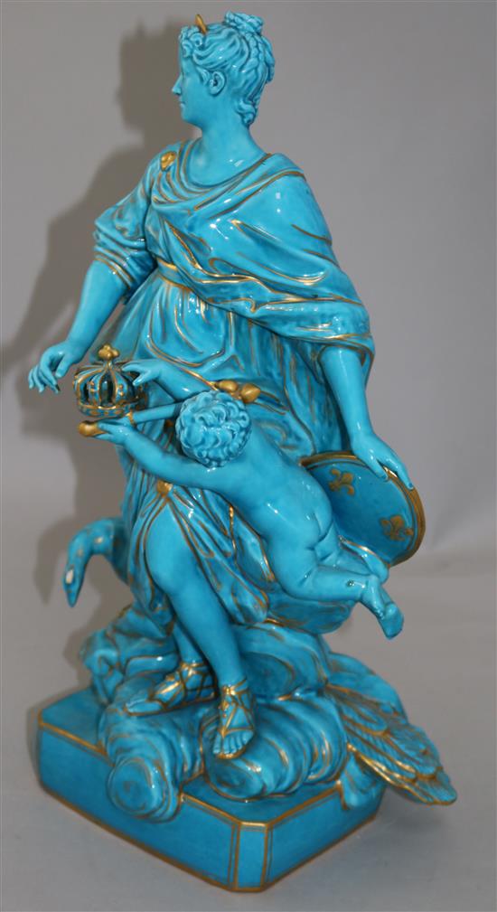 A Sevres style turquoise glazed and gilt decorated group of the Queen cherub, 42cm